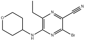 3-bróm-6-etyl-5-((tetrahydro-2H-pyrán-4-yl)amino)pyrazín-2-karbonitril